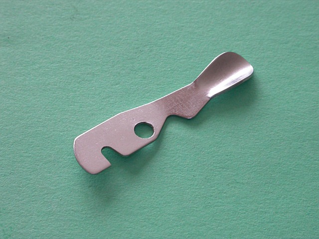 Páčka-držení vrtáčku